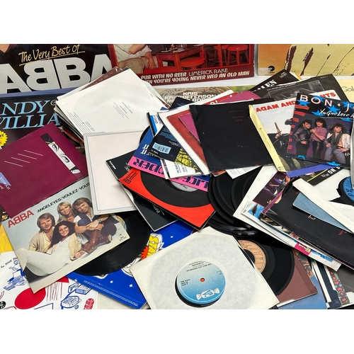 432 - A collection of LP, vinyl records, 45’s singles.