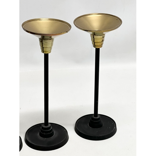 301 - A set of 6 Art Deco style candlesticks. 23.5cm. 18.5cm. 13.5cm.