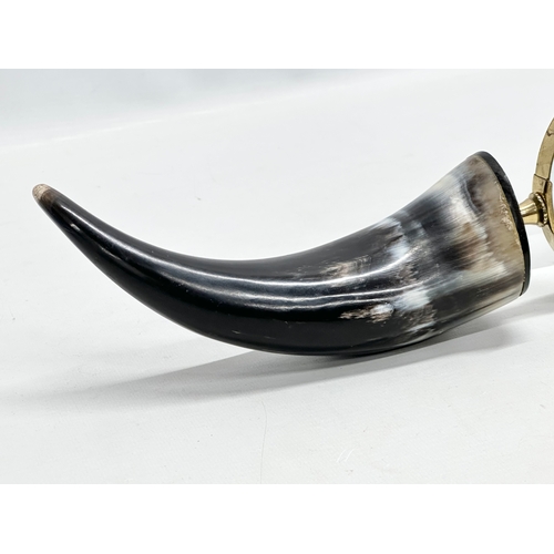 302 - A vintage horn handled magnifying glass. 30cm