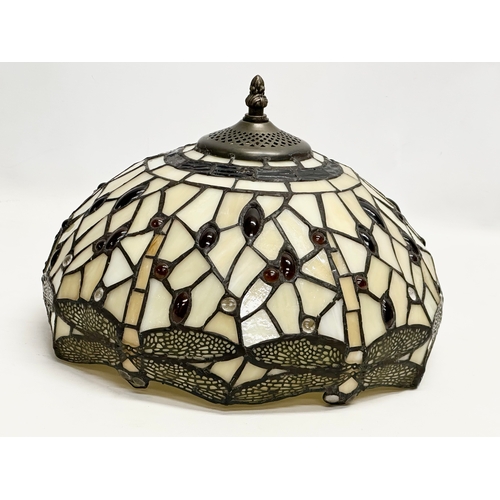 286 - A pair of Tiffany style lamp shades. 32x22cm.