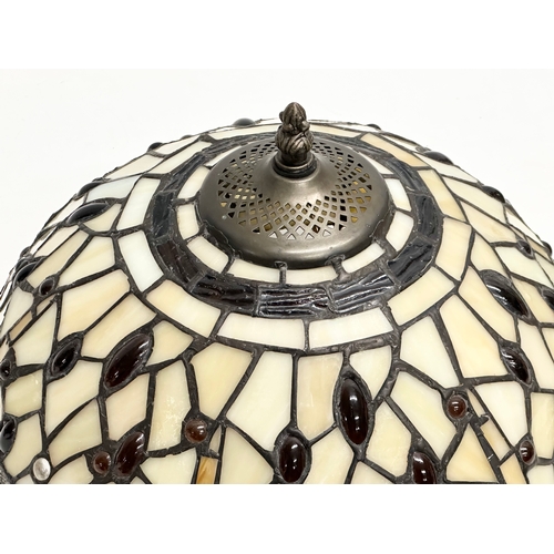 286 - A pair of Tiffany style lamp shades. 32x22cm.