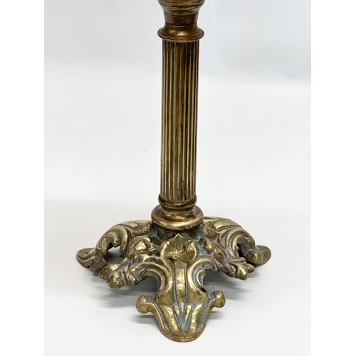 272 - A tall 19th Century Victorian double burner oil lamp. With reeded brass column and glass bowl. 67cm