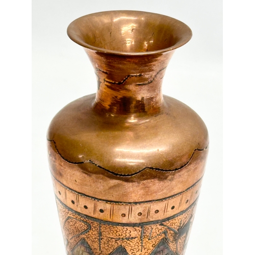 304 - An Early 20th Century Egyptian copper vase. 19cm.