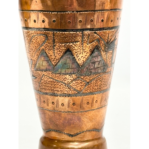 304 - An Early 20th Century Egyptian copper vase. 19cm.