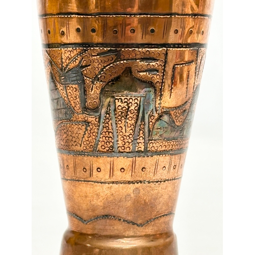 304 - An Early 20th Century Egyptian copper vase. 19cm.