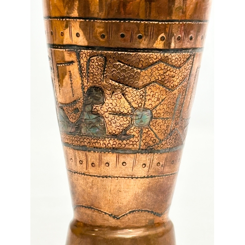 304 - An Early 20th Century Egyptian copper vase. 19cm.