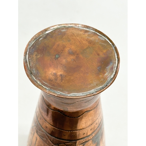 304 - An Early 20th Century Egyptian copper vase. 19cm.