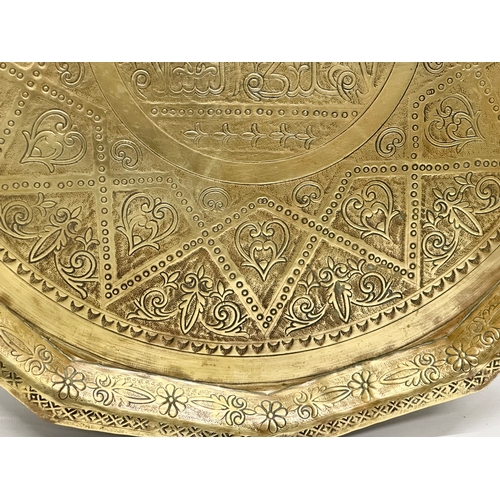 275 - A 19th Century Middle Eastern brass tray/wall plaque. 49cm