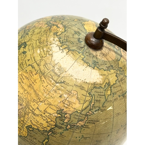 30 - Bacon’s Excelsior Globe. A good quality Early 20th Century tabletop globe. 20x35cm.