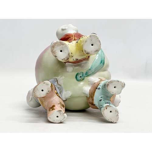 343 - A Chinese ceramic figure of 3 children and peach. 18x25cm