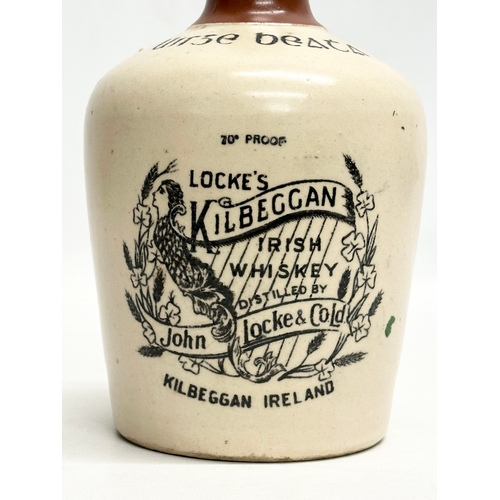 434 - John Locke & Co LTD. A Locke’s Kilbeggan Irish Whiskey stoneware flagon/jug. 20cm