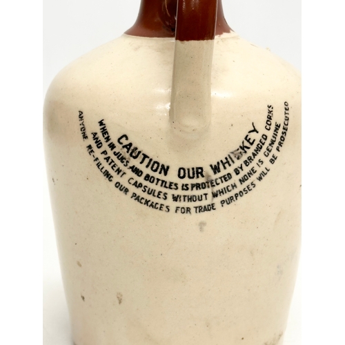 434 - John Locke & Co LTD. A Locke’s Kilbeggan Irish Whiskey stoneware flagon/jug. 20cm