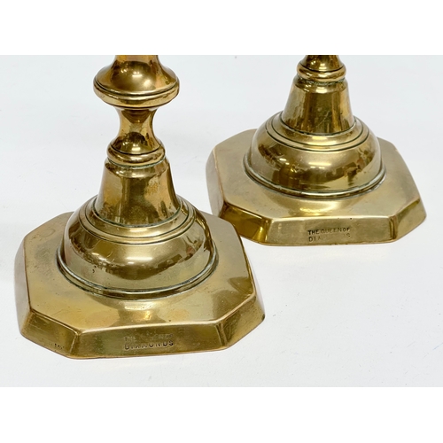 446 - A pair of Victorian brass candlesticks. The King and Queen of Diamonds. 29cm