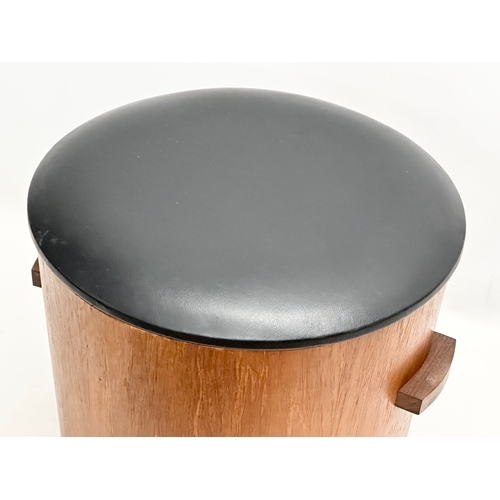 230B - A Mid Century teak coal bin/stool with black vinyl seat. 43x41x37cm