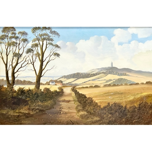 135 - Robert B. Higgins. A large oil on canvas. Country Lane. Scrabo Tower. 91x61cm. Frame 111x80cm.