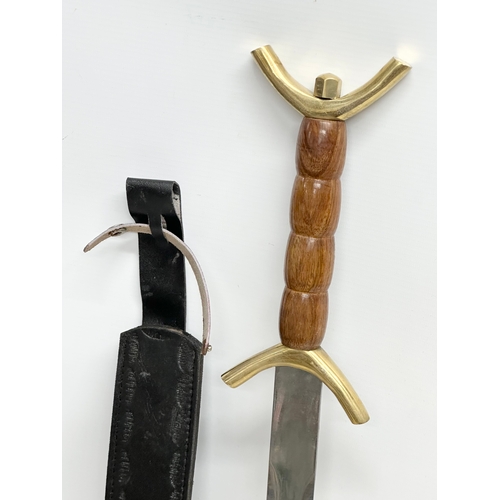 422 - A Celtic style sword. 79cm