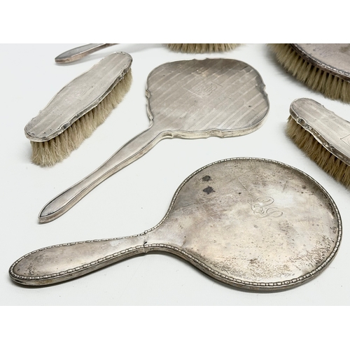 471 - Silver backed vanity brushes and mirrors