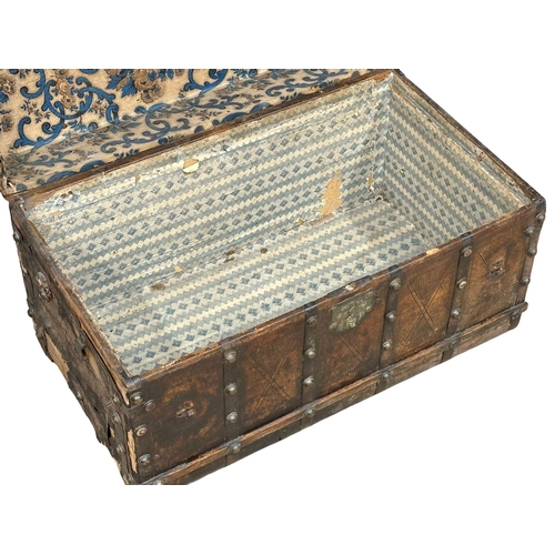 10 - A good quality Mid 19th Century Louis Vuitton style leather bound trunk. 82x49x52cm