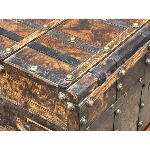 10 - A good quality Mid 19th Century Louis Vuitton style leather bound trunk. 82x49x52cm