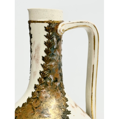 311 - A rare Late 19th Century Doulton Burslem pottery spill vase/ewer. Decorated with painted gilt and br... 