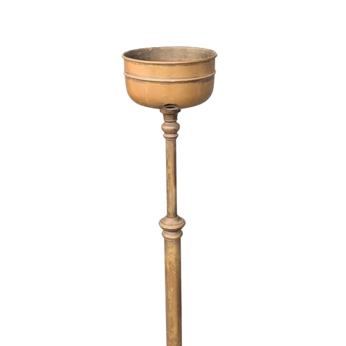 132 - A large Victorian telescopic brass oil lamp stand. 141cm