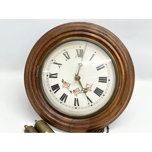 396 - A Late 19th Century Victorian wag on the wall clock. With weights and pendulum. 33x23x34cm