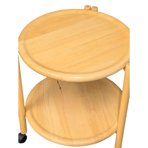 A Jens Quistgaard. A Danish Mid Century folding trolley designed by ...