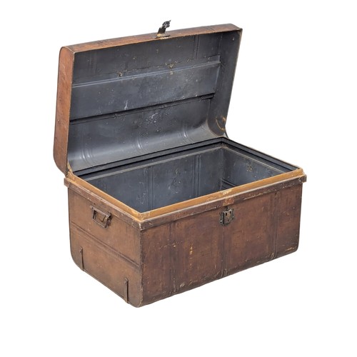 385 - An Early 20th Century trunk. 73x48x44cm