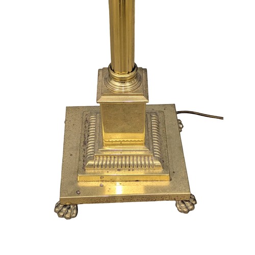 1096 - A brass standard lamp with Corinthian style column. 167cm. 6