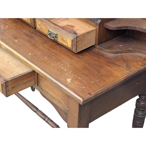 1098 - A Late Victorian walnut dressing table(4)