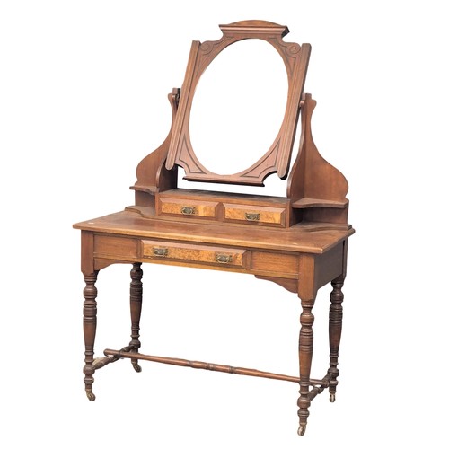 1098 - A Late Victorian walnut dressing table(4)