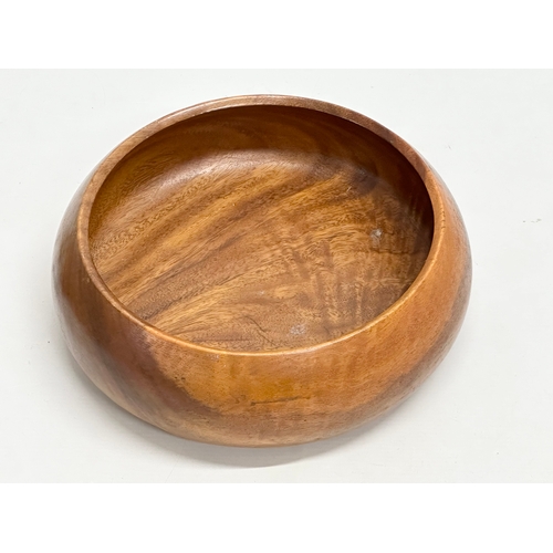 225C - A large teak bowl with wooden fruit. 30x11cm