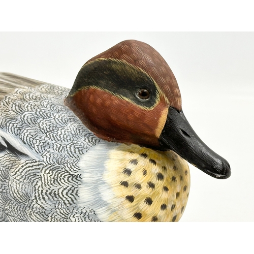 401 - Mike Wood. A good quality hand painted wooden mallard/duck by Mike Wood. 27cm