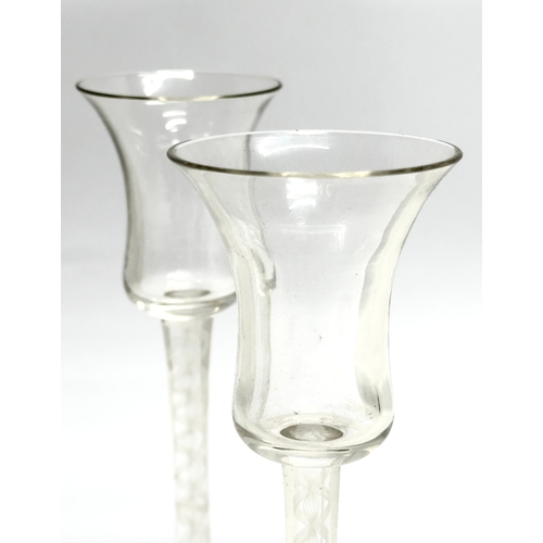 57 - A pair of 18th Century George III tall sherry glasses/wine glasses, with air twist stems. Circa 1760... 