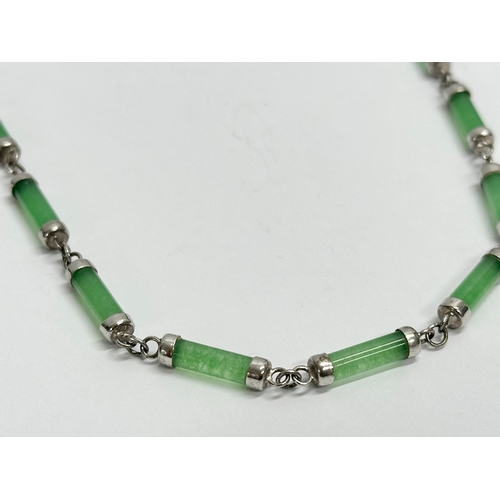 482 - A silver and jade necklace. 925. 24cm closed.