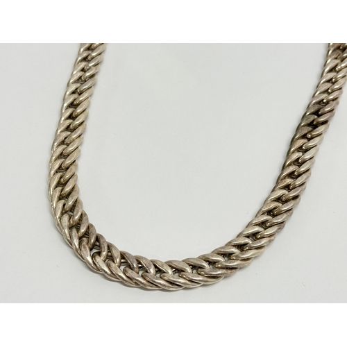 483 - A thick silver necklace. 925. Stamped B.B. 59.85 grams.