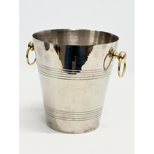 99 - A pair of vintage French Art Deco silver plated ice buckets. 24x19.5x21cm