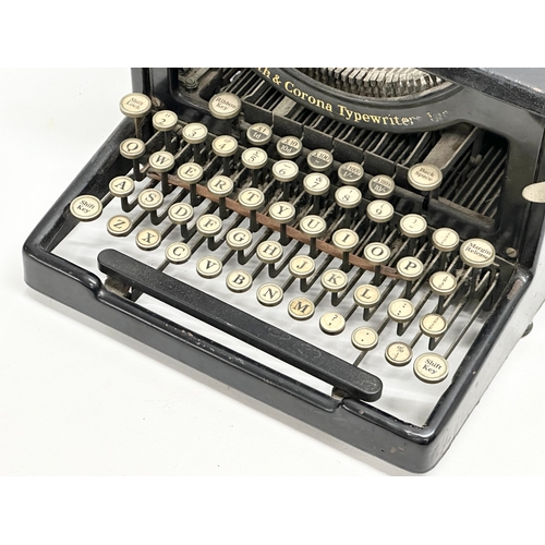 100 - An Early 20th Century L.C. Smith & Corona typewriter. 26x37x25cm