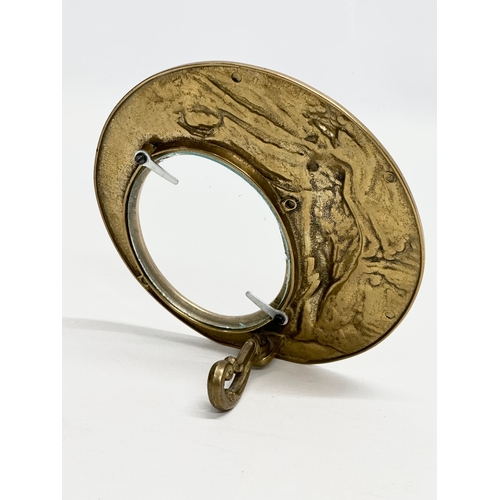 404 - A 20th Century Art Nouveau style brass photograph frame. 16cm