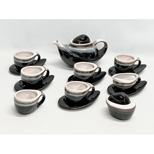 412 - A 15 piece Mid Century glazed stoneware tea service.