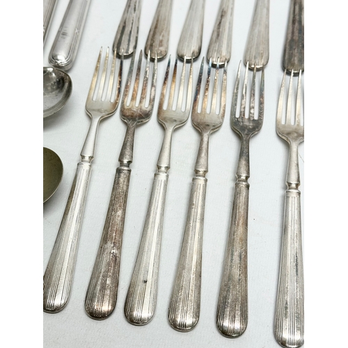 421 - A collection of Early 20th Century silver plated cutlery. Including Walker & Hall, Elkington.