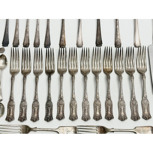 421 - A collection of Early 20th Century silver plated cutlery. Including Walker & Hall, Elkington.