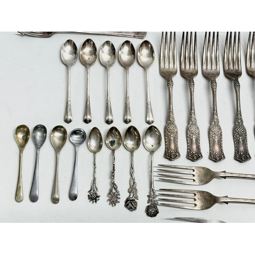 421 - A collection of Early 20th Century silver plated cutlery. Including Walker & Hall, Elkington.