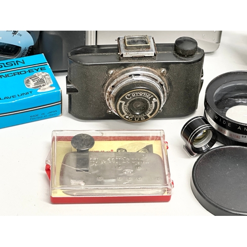 425 - A collection of vintage cameras and accessories.