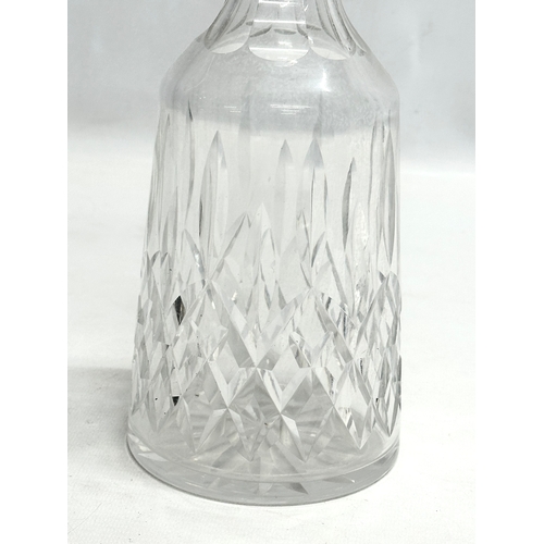 83 - A Waterford Crystal “Lismore” decanter. 33cm