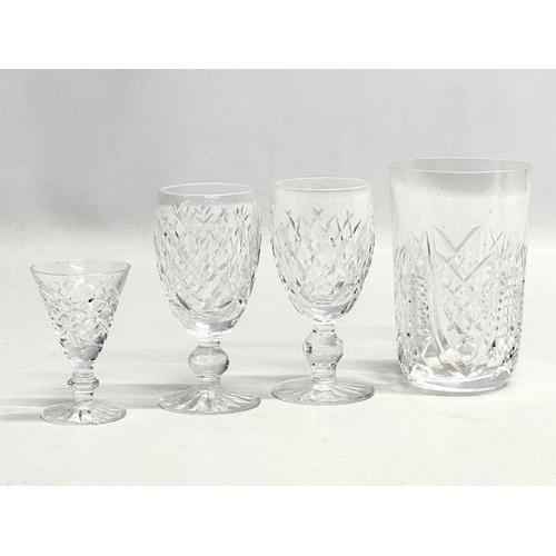 427 - Waterford Crystal. A pair of Waterford “Boyne” port glasses 11cm. A Waterford “Clare” whiskey glass ... 