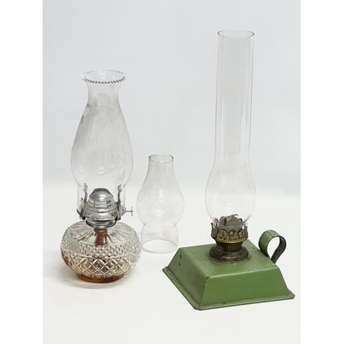 417 - 2 Early 20th Century oil lamps. 16x16x40cm. 33cm