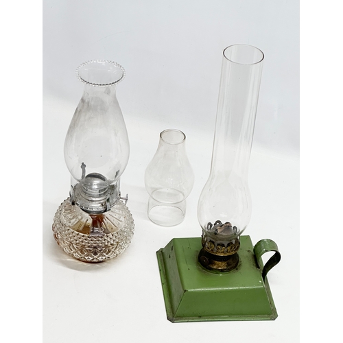 417 - 2 Early 20th Century oil lamps. 16x16x40cm. 33cm