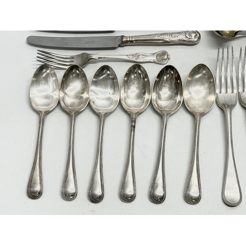 433 - A quantity of vintage silver plate. Silver plated cutlery, crust set, salt and pepper shakers, cigar... 