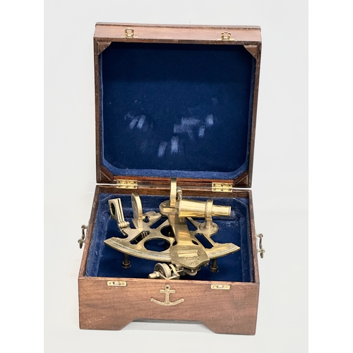 66 - Ross Evans, London. An Early 20th Century brass sextant with case. By Ross Evans.